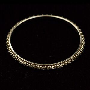 GOLD TONE BANGLE ADORNED WITH SMALL GOLD COLORED BEADS - JBBTGB1